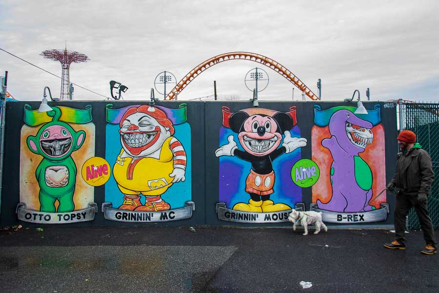 A dog exploring the Coney Island Art Walls.