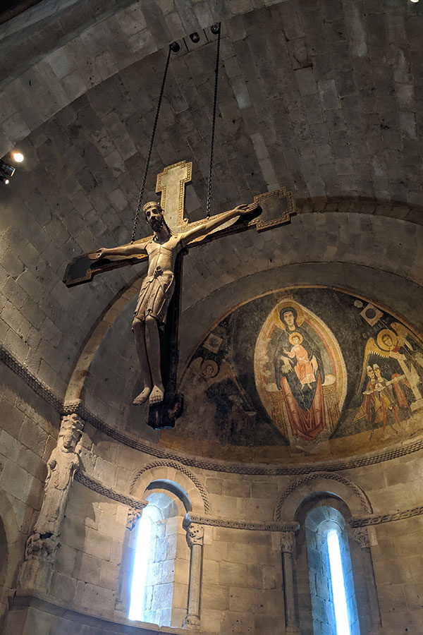 A crucifix hangs in the Fuentidueña Apse.