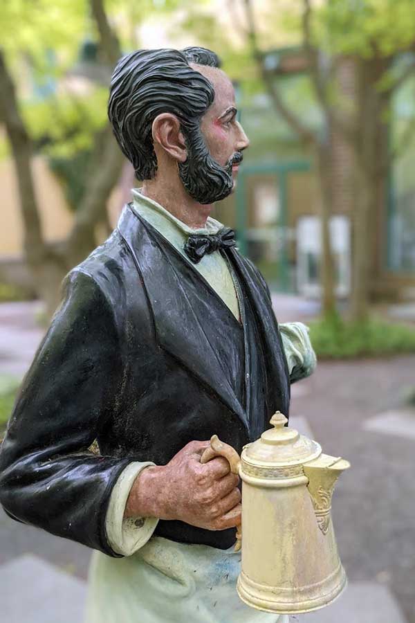 A waiter, part of Seward Johnson's "Eye of the Beholder."