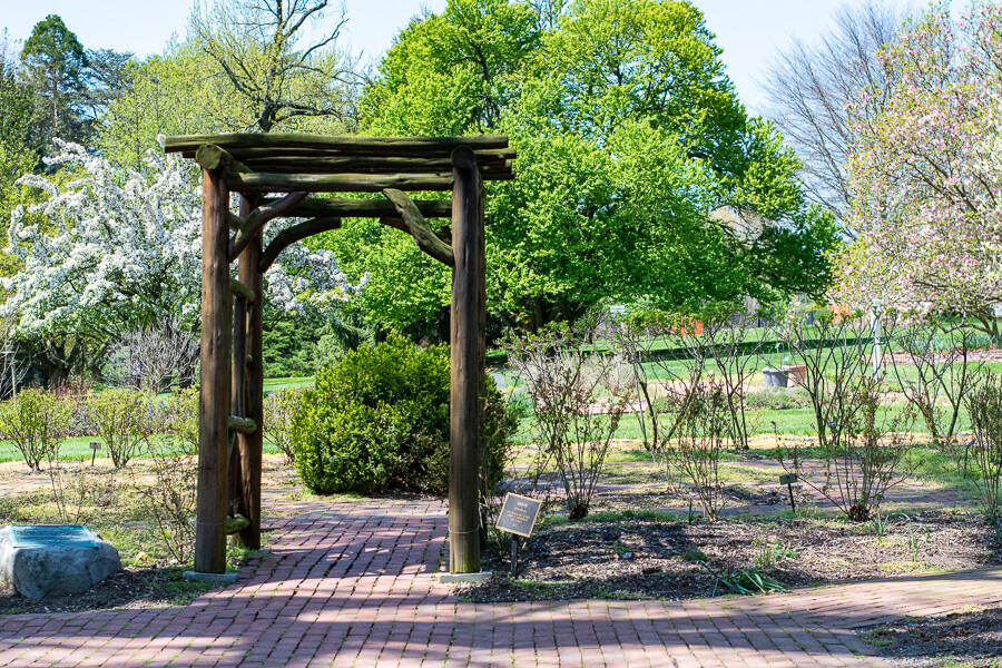 A trellis on a walkway at Hershey Gardens.