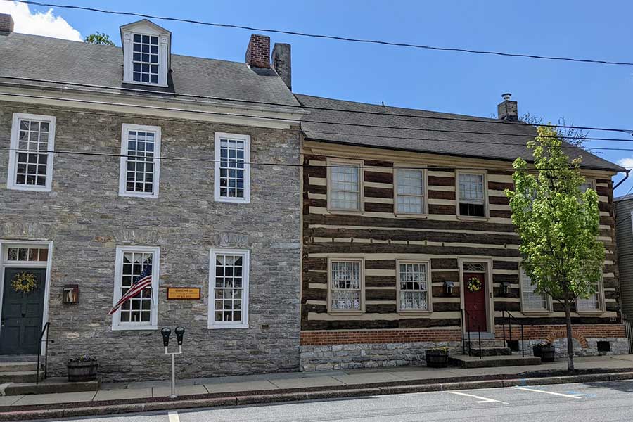 Historic stone and wooden houses line Main Street in Historic Downtown Lititz, PA.