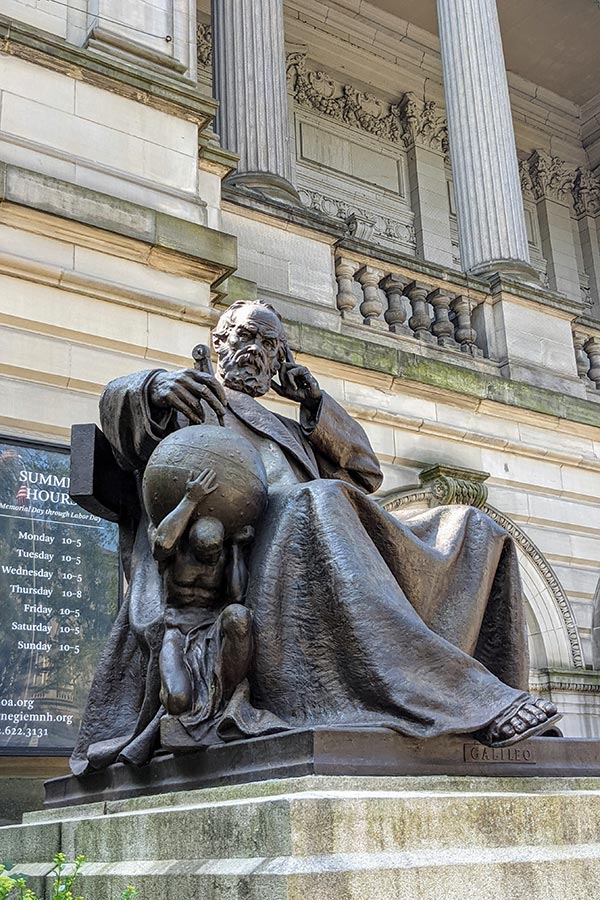 A sculpture of Galileo sits outside of the Carnegie Music Hall in Pittsburgh.