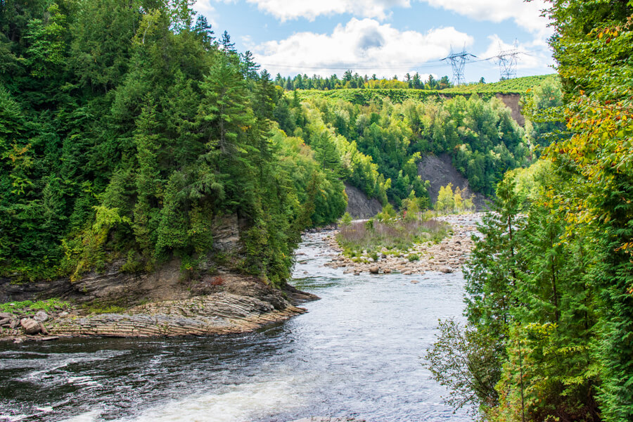 The Sainte Anne du Nord River cuts through the canyon.