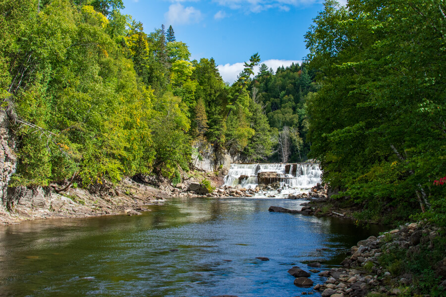 Just upriver of the waterfall is a small collection of falls.