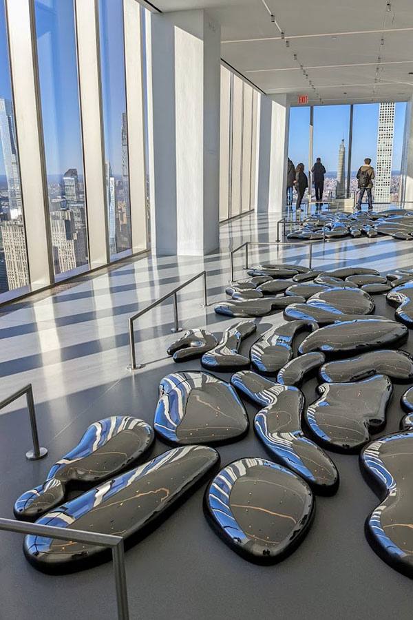 Yayoi Kusama work Cloud dominates the floorspace of the a section of Summit One Vanderbilt.