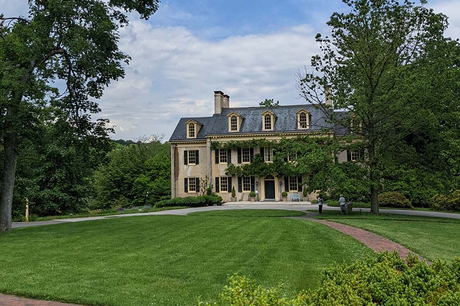 The Georgian-style Eleutherian Mills is the first du Pont family home in America.