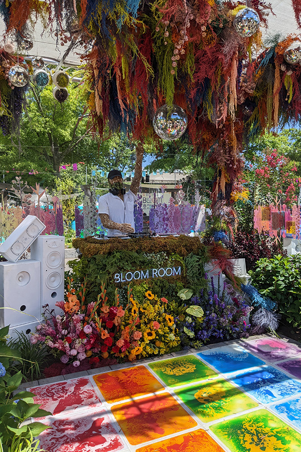 A plant DJ plays the tunes in the Bloom Room at the Flower Show.