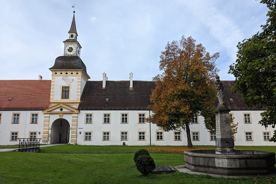 Looking across the courtyard at the clock tower that is part of Schleissheim Palace.