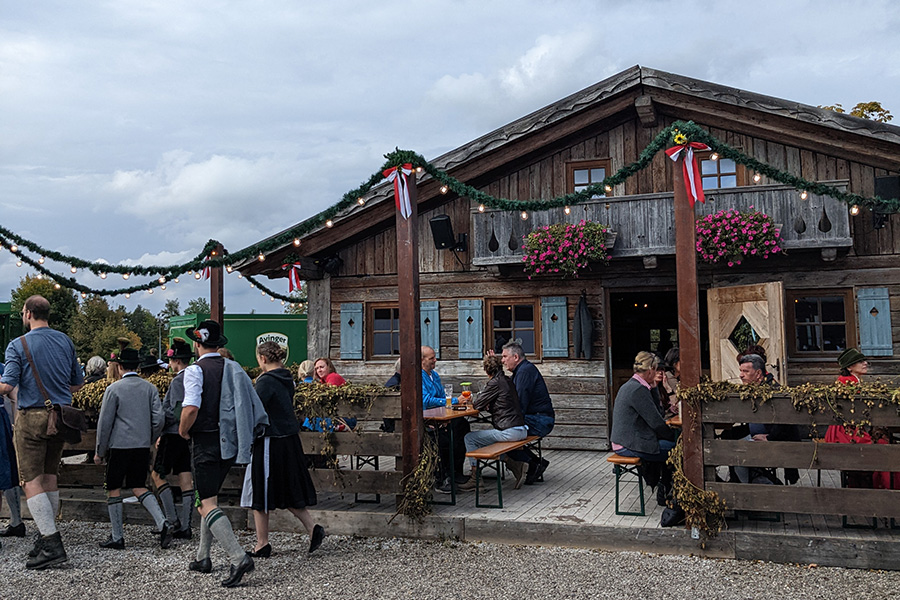 A festival hut sits on the edge of the field for the Ayinger Bräu-Kirta.