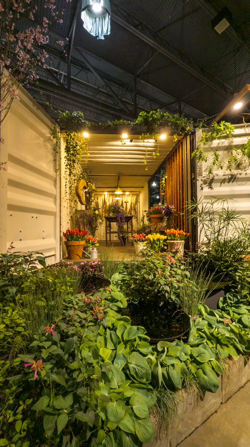 A potting shed inside of a shipping container.