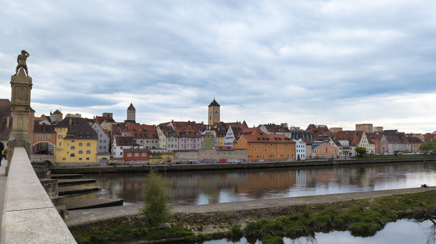 The Bruckmandl, a sculpture on the Stone Bridge, looks onto the Regensburg Altstadt.