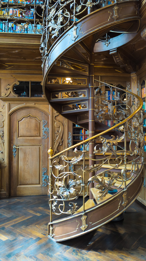 Stunning gold-plated wrought-iron spiral staircases in Munich Art Nouveau style in the Munich Law Library.