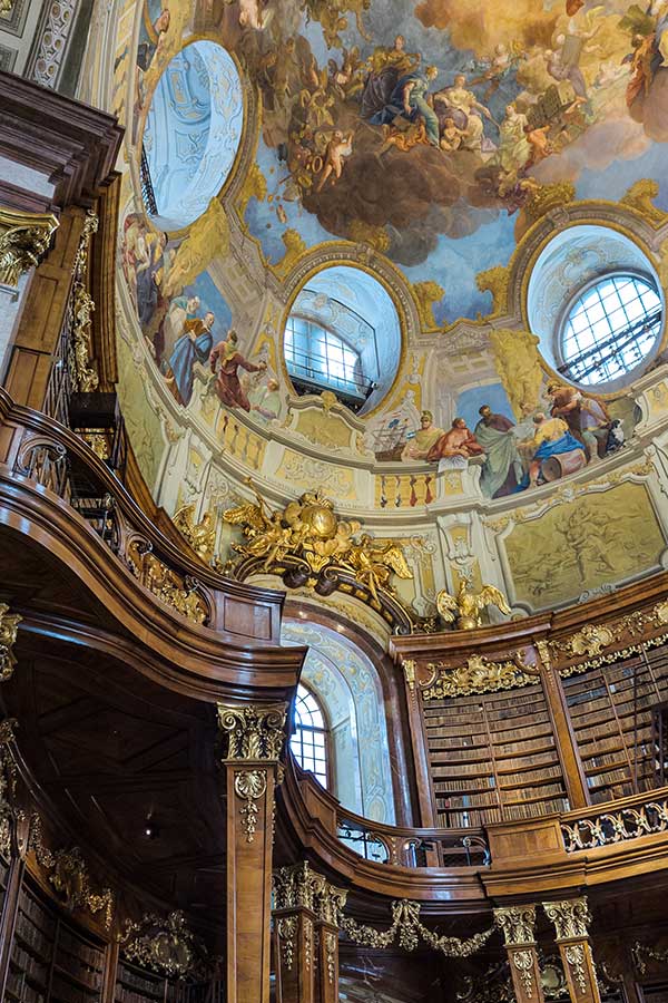 The library uses walnut for bookcases and paneling throughout the State Hall in Vienna.