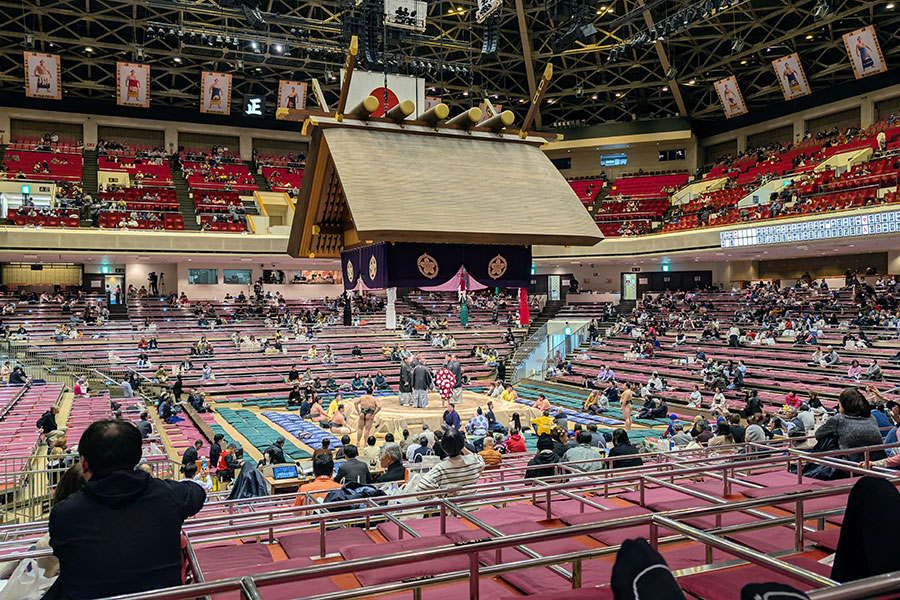 Crowds gather inside the Ryogoku Kokugikan in Tokyo.